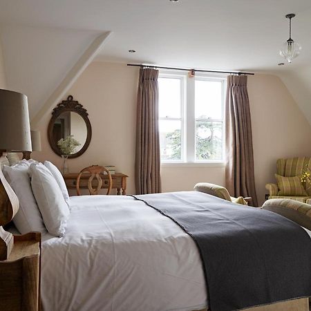 Cotswold Grange Bed & Breakfast Челтнъм Екстериор снимка A bedroom at The Pig